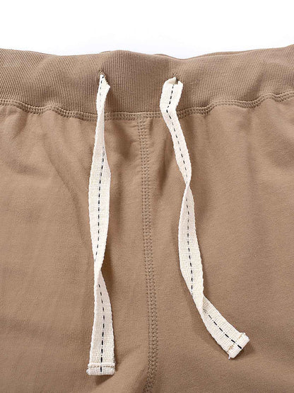 メンズ コットンスウェットショートパンツ — ドローストリングウエストのリラックスカジュアルスタイル